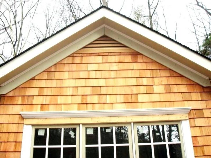A home with wooden shingle siding.